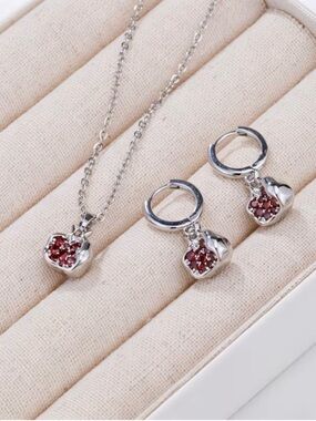 Silver Heart Pendant Necklace and Hoop Earrings with Red Gem Accents